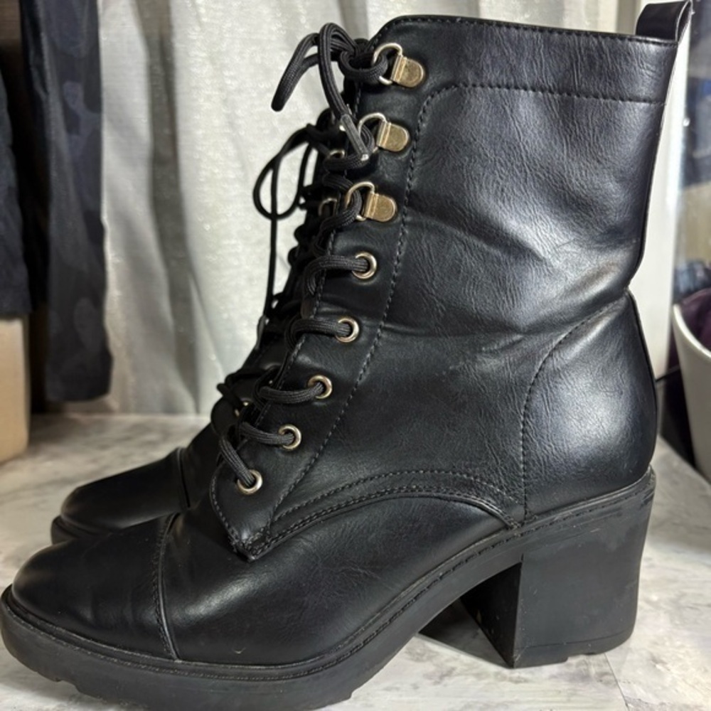 Woman’s black heeled boots size 10
